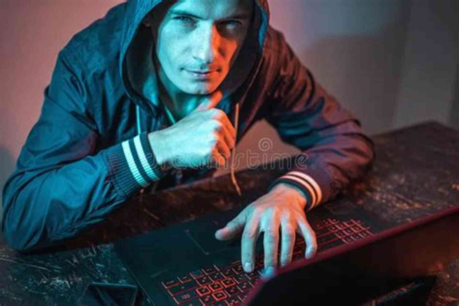 Hacker In A Hoodie Typing On A Keyboard Hacker Hoaxer Whistleblower Spy: The Many Faces Of Anonymous